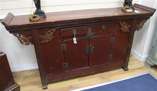 A Chinese painted side cabinet, 19th century, fitted drawers, W.180cm